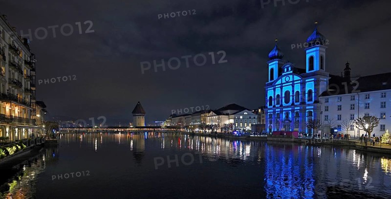 Water tower and Jesuit church on the right with light installation, on the Reuss at dusk, Old Town, Lilu, Light Festival 2025, Lucerne, Canton of Lucerne, Switzerland, Europe
