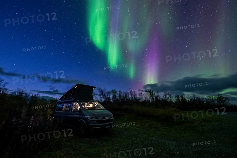 Northern lights over camper, VW California, Lyngen, Troms og Finnmark, Norway, Europe