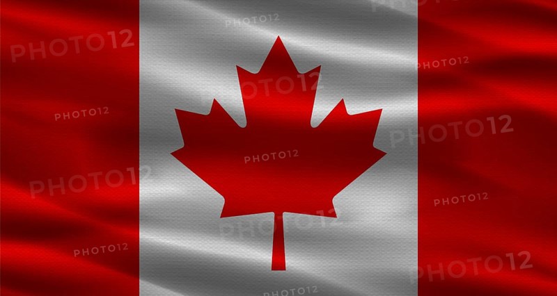 Canada flag with fabric texture waving. Close up of flag of Canada with cloth texture.
