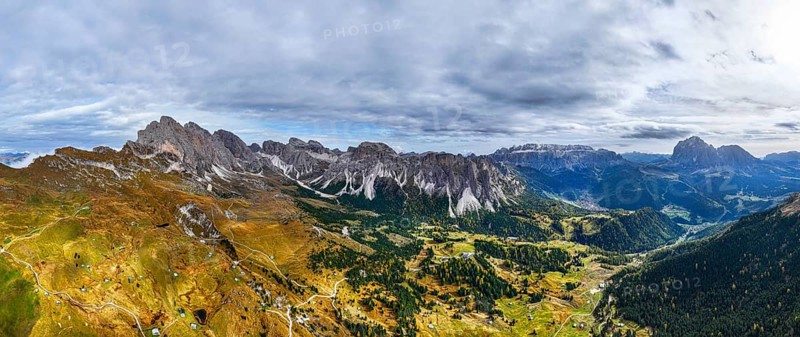 Dark clouds over the Geisler and Puez Group, wide-angle panoramic shot, drone shot, Val Gardena, Dolomites, Autonomous Province of Bolzano, South Tyrol, Italy, Europe