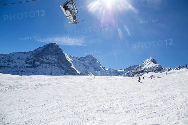 25 March 2024: Skiing against the backdrop of the north face of the Eiger in Grindelwald, Switzerland, Europe