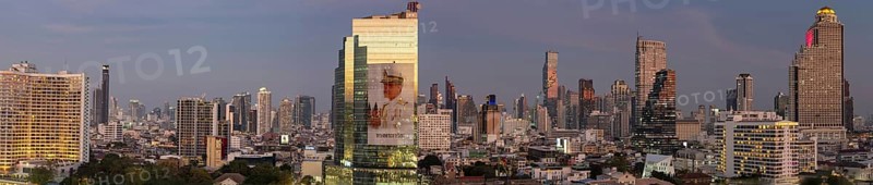 Panorama from the viewing platform of the Iconsiam on CAT Tower with huge billboard of the Thai King Maha Vajiralongkorn, skyscrapers, hotels and the banking district Bang Rak, skyline of Bangkok, Thailand, Asia