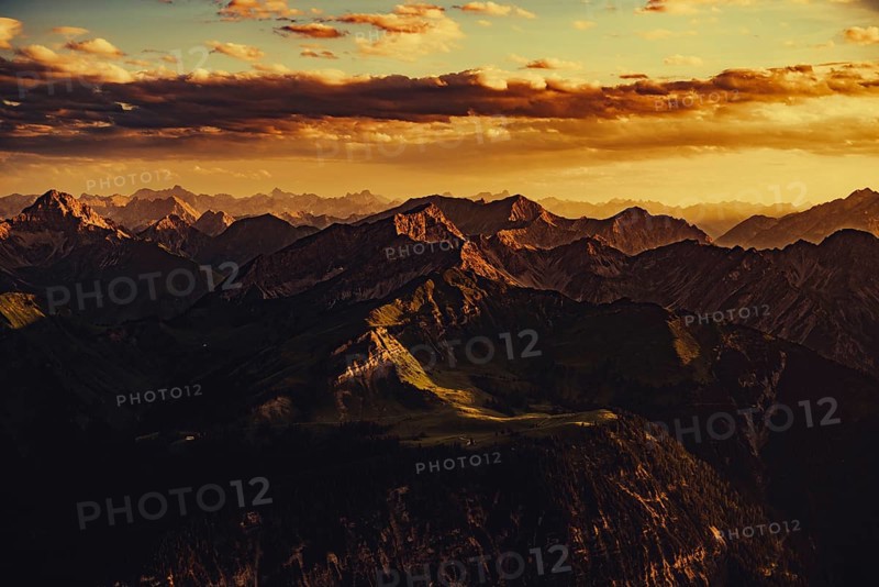 Thaneller summit at sunset in the Lechtal valley in Tyrol with a wonderful view of the surrounding mountains. Tyrol, Austria, Europe