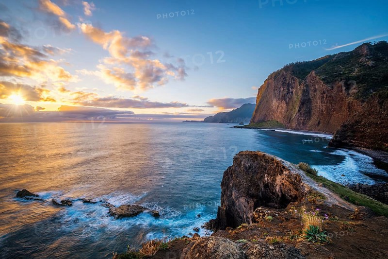 View of Madeira scenic cliffs coastline landscape on sunrise, Guindaste viewpoint, Madeira island, Portugal, Europe