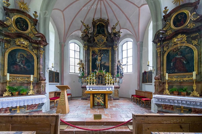 Parish church of St Sebastian with richly decorated altar, statues of saints and paintings, framed by a vaulted ceiling and large windows, Ramsau, Berchtesgadener Land, Bavaria, Germany, Europe