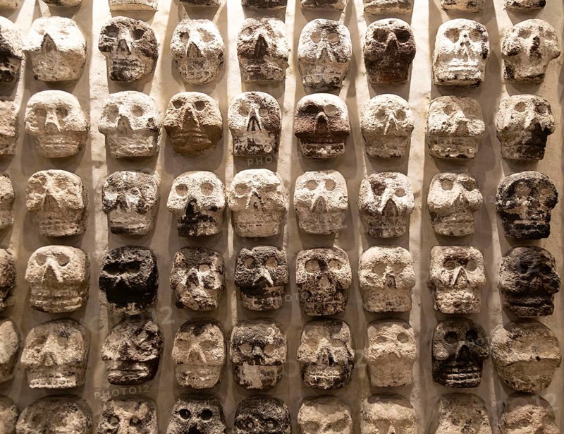 Wall of stone human skulls, archaeological site and museum of Templo Mayor, Mexico City, Mexico, Central America