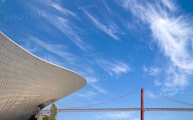 Lisbon, Landmark suspension 25 of April bridge over Tagus reiver near Belem tower