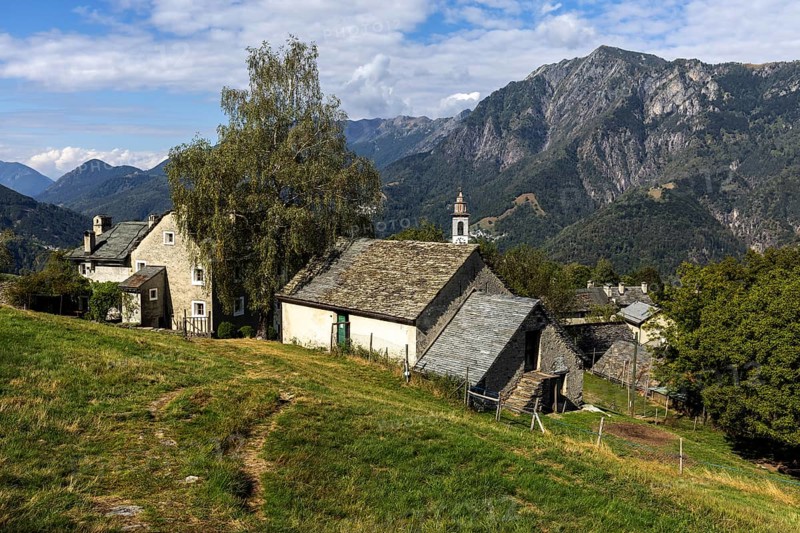 View of the village, typical Ticino stone houses in the mountain village of Rasa, Centovalli, Canton Ticino, Switzerland, Europe
