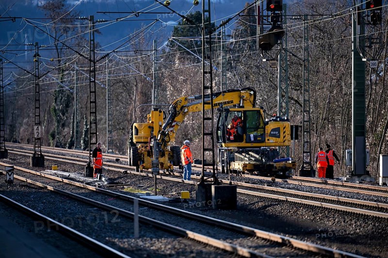 Labourers working with Liebherr A922 Rail Litronic and Kuhnle RR14 EVO 3 Rail two-way working platform on rails, line closure, construction site implementation Digital node between Waiblingen and Bad Cannstatt, Stuttgart, Baden-Württemberg, Germany, Europe