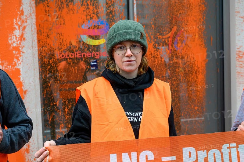 Regina Stephan, Last Generation activist after colour attack on Total Energies building. They are protesting against the World LNG Summit, which is due to take place in Berlin in December. Berlin, 06.11.2024