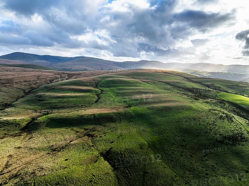 Farms over Black Mountain from a drone, Brecon Beacons National Park, Carmarthenshire, Wales, England, United Kingdom, Europe