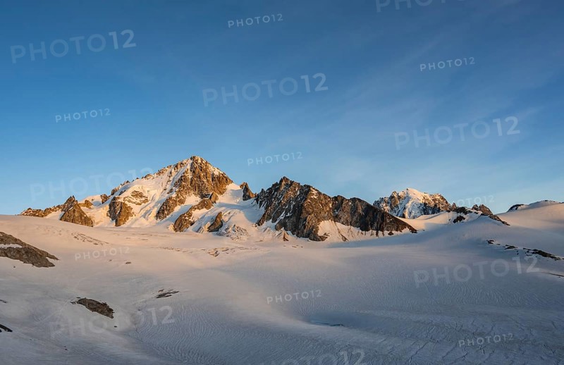 High alpine mountain landscape at sunset, Glacier du Tour, Glacier and mountain peaks in the evening light, summit of the Aiguille de Chardonnet, Chamonix, Haute-Savoie, France, Europe
