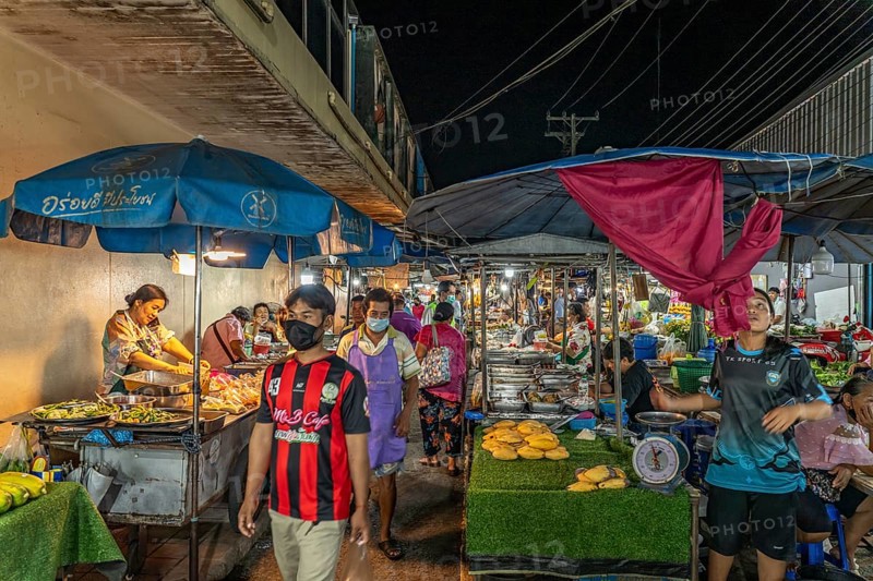 Food stalls with street food at the night market in Trat, Thailand, Asia