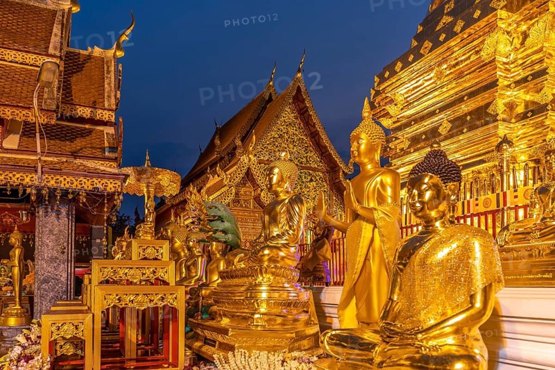Buddha statues in the Buddhist temple complex Wat Phra That Doi Suthep, landmark of Chiang Mai at dusk, Thailand, Asia