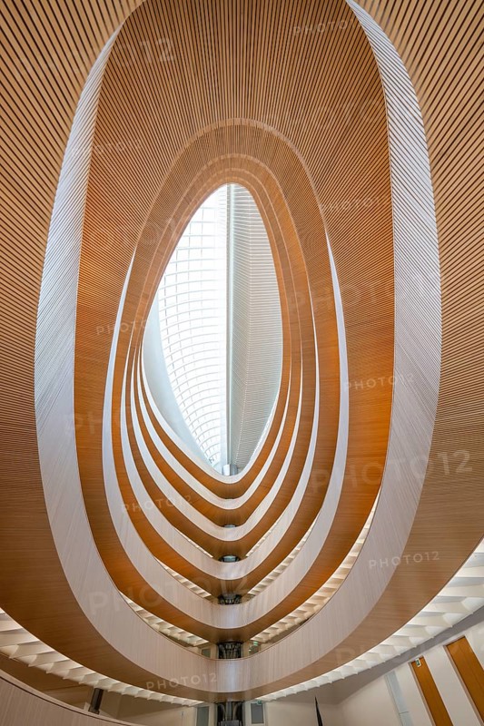 Futuristic interior design with spiral-shaped wooden structures and glass roof, UB- Recht, Zurich, Switzerland, Europe