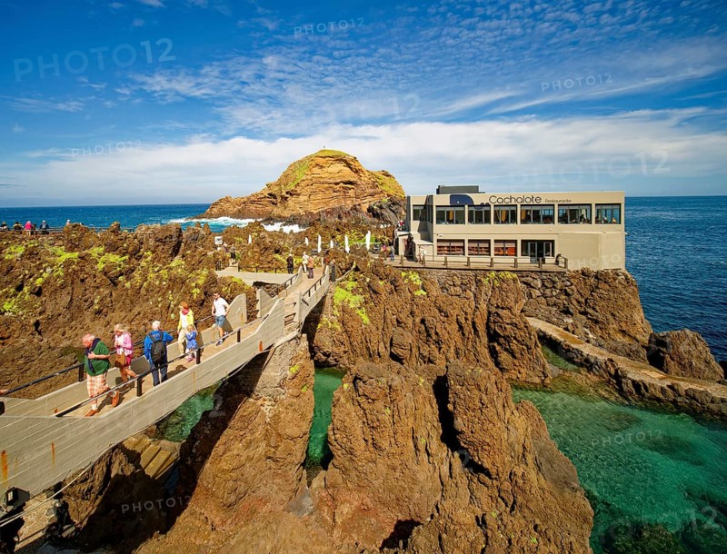 Natural swimming pools in volcanic rock, Cachalote restaurant, lava pools, natural swimming pools, natural pools, rocky coast, bathing complex, Porto Moniz, Madeira, Portugal, Europe