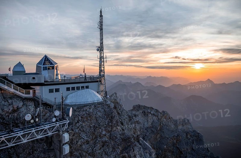 Mountain station of the Tyrolean Zugspitze railway at the summit of the Zugspitze, at sunset, Wetterstein Mountains, Northern Limestone Alps, Bavaria, Germany, Europe