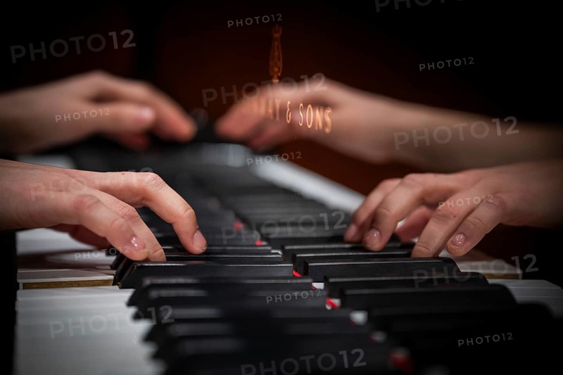 Hands of a young pianist playing on the keyboard of a Steinway & Sons grand piano, Stuttgart, Baden-Württemberg