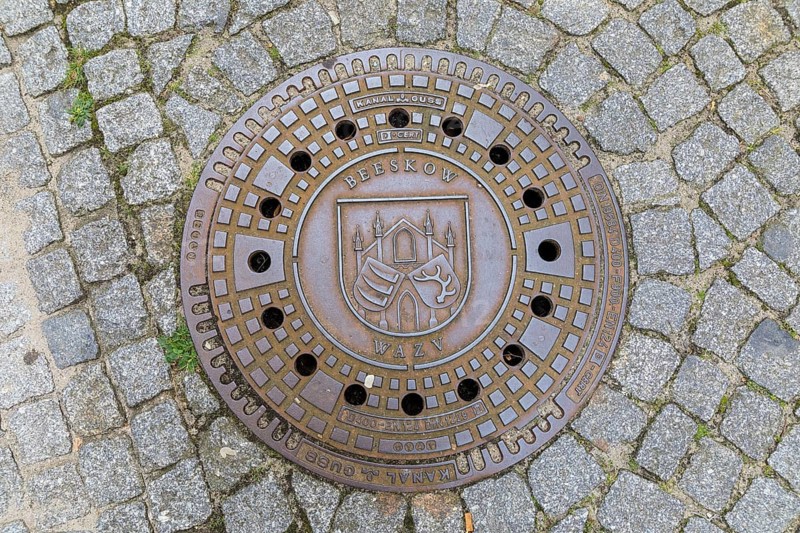 Manhole cover with coat of arms in Beeskow, Brandenburg, Germany, Europe