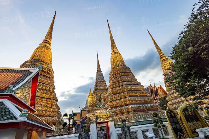 Wat Pho temple at sunset. Bangkok's oldest Buddhist monastery near the Grand Palace. Four chedis are among the most precious in Bangkok. Bangkok, Thailand, Asia