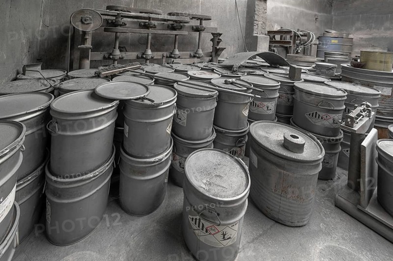 Metal barrels covered with zinc dust in the filling room for zinc powder of a metal powder mill, founded in 1900, Igensdorf, Upper Franconia, Bavaria, Germany, Europe