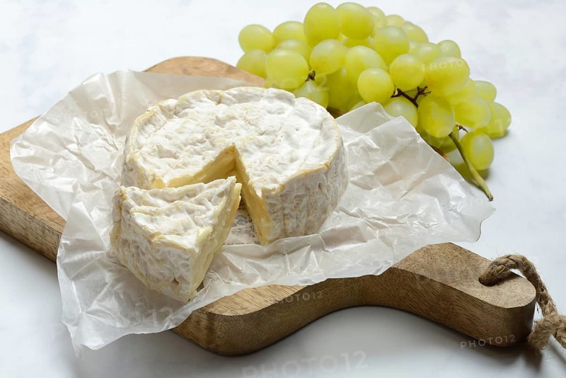 French Camembert, cheese on a wooden board