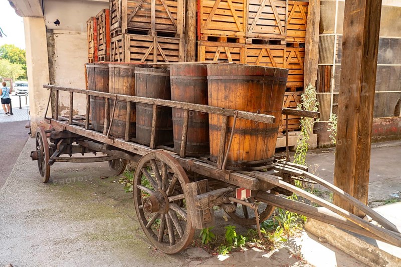 Wine barrels on a historic wooden cart, Ribeauville, Alsace, France, Europe