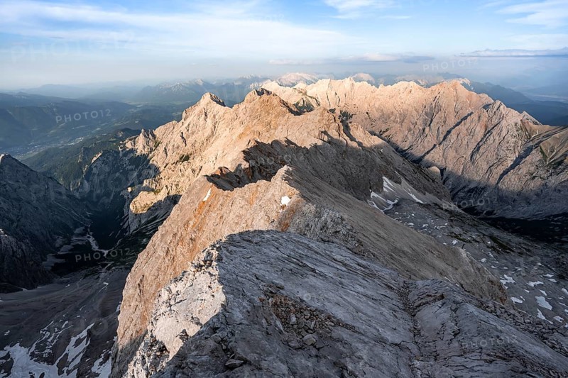 Impressive rocky mountain landscape in the evening light, steep mountain ridge, Jubiläumsgrat with Alpspitze, Zugspitze, Wetterstein range, Bavaria, Germany, Europe