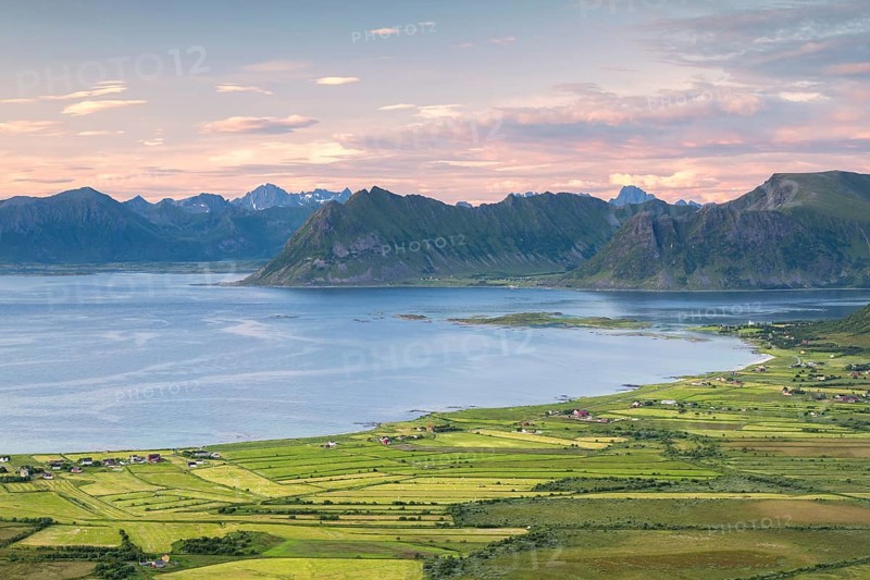 View of the coast and mountains from Mount Hoven, Gimsoy, Lofoten, Norway, Europe