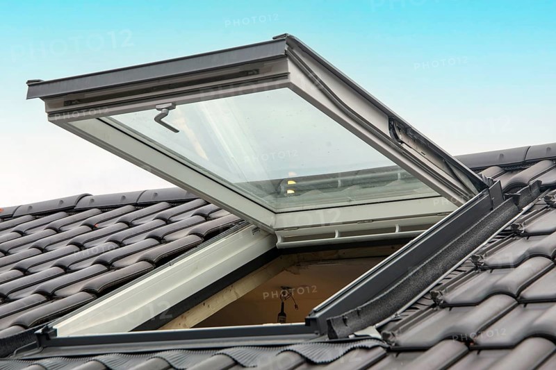 New skylight on a newly tiled roof