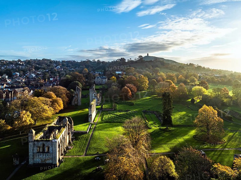Sunrise over Glastonbury Abbey from a drone, Glastonbury, Somerset, England, United Kingdom, Europe