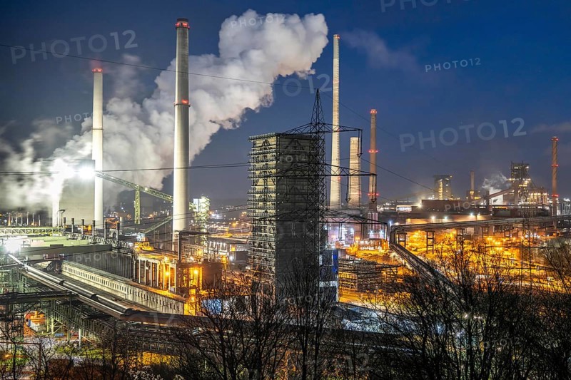 The Thyssenkrupp Steel steelworks in Duisburg-Marxloh, on the Rhine, quenching tower of the coking plant, blast furnaces 1 and 2, right, North Rhine-Westphalia, Germany, Europe