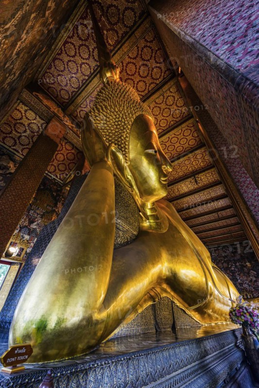 The reclining Buddha in Wat Pho temple, reclining, rest, resting, Buddhism, religion, world religion, sculpture, sculpting, art, statue, culture, believing, faith, peace, Asian, travel, holiday, tourism, representation, palace, tradition, traditional, decoration, decorated, house of prayer, building, attraction, landmark, gilded, gold, holy, pray, meditation, monastery, spirituality, meditate, spiritual, monument, famous, sight, philosophy, architecture, capital, Bangkok, Thailand, Asia