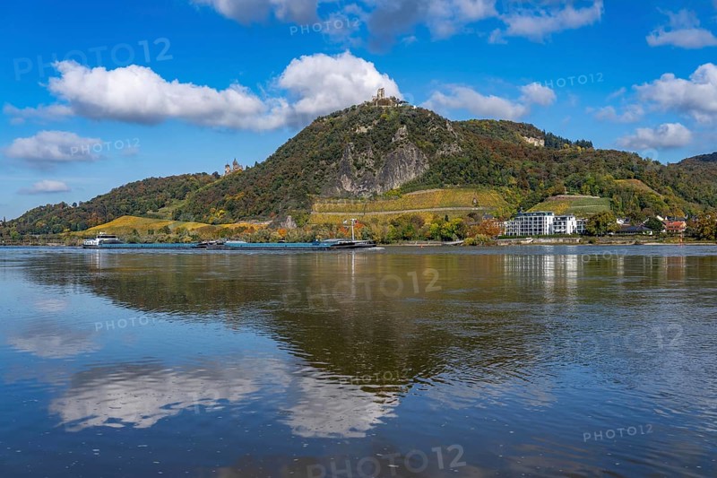 Drachenfels, a mountain in the Siebengebirge on the Rhine between Bad Honnef and Königswinter, with Drachenfels castle ruins and Drachenburg castle, left, boat traffic on the Rhine, North Rhine-Westphalia, Germany, Europe
