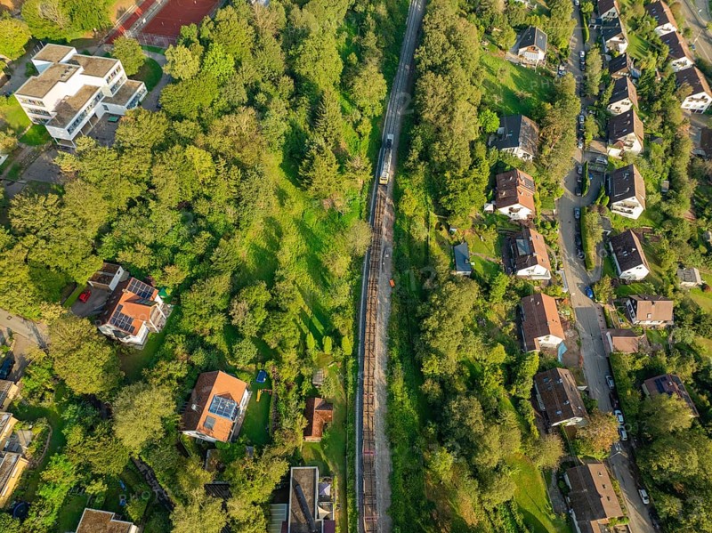 Railway line through green residential areas and landscapes, track construction, rail delivery for Hermann Hessebahn, Calw, Black Forest, Germany, Europe