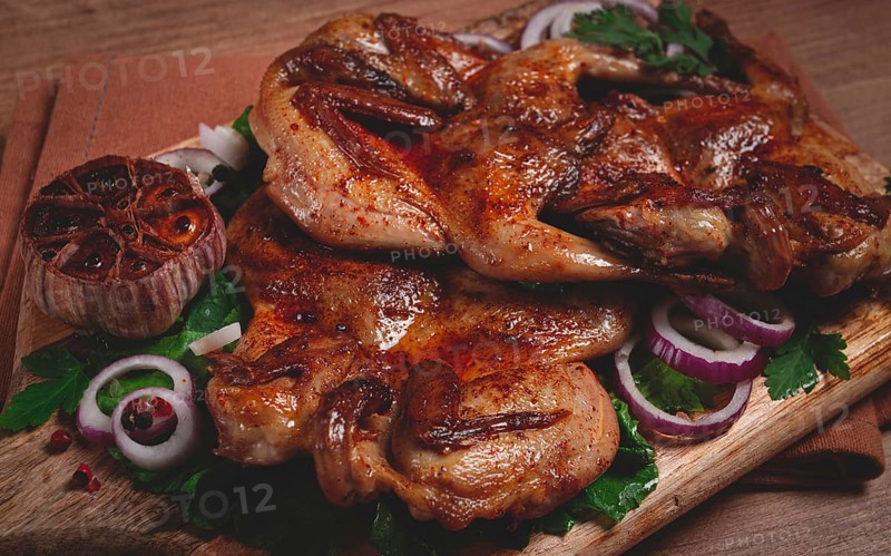 Fried, quail meat, tobacco (tapaka), with spices, homemade, no people