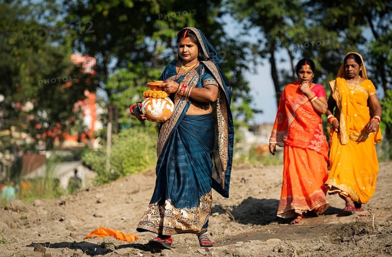 Hindu devotees perform rituals as they offer prayers to the Sun god in the bank of Brahmaputra river on the occasion of the 'Chhath Puja' festival in Guwahati, Assam, India on 7 November 2024. Chhath Puja is a significant Hindu festival celebrated primarily in the Indian states of Bihar, Jharkhand, Uttar Pradesh, and in Nepal. Dedicated to the worship of the Sun God (Surya) and his wife Usha (also referred to as Chhathi Maiya), this festival seeks blessings for prosperity, health, and longevity