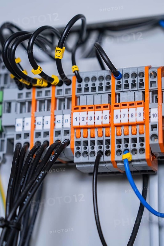 Detailed view of individual circuit-breakers in a larger electrical system, professional technology recognisable, switch cabinet construction, PV system construction, major customers, Enzkreis, Germany, Europe