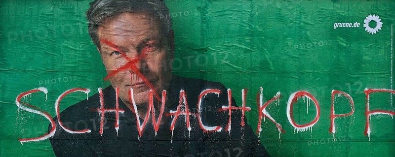 Denigration of a large poster for the 2025 federal election by the Greens with Robert Habeck, Witten, Ruhr area, Germany, Europe