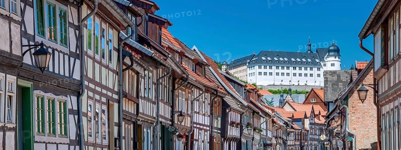 Street with half-timbered houses in the old town, the castle in the background, Stolberg im Harz, Saxony-Anhalt, Germany, Europe