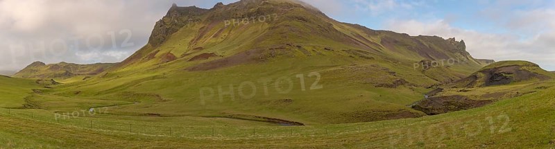 Grass and moss covered mountain close to Vik i Myrdal, South Iceland