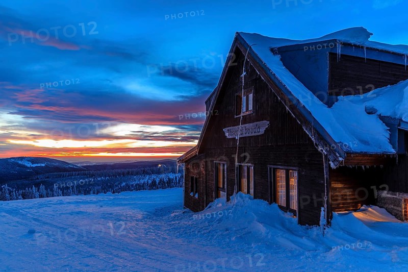 Wossecker Baude at dusk on a winter's day, Harrachsdorf in the Giant Mountains, Czech Republic, Europe
