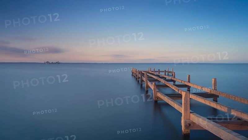 View of a partially dismantled jetty on the Steinhuder Meer, long exposure, Wilhelmstein, Hagenburg Canal, lake, nature photo, landscape photography, drifting clouds, landscape format, wood, Hagenburg, Hanover region, Lower Saxony, Germany, Europe