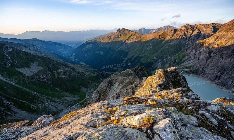 Picturesque mountain landscape at the summit of Mont de la Blana at sunset, view of La Dixence valley, Hérémence, Valais, Western Alps, Switzerland, Europe