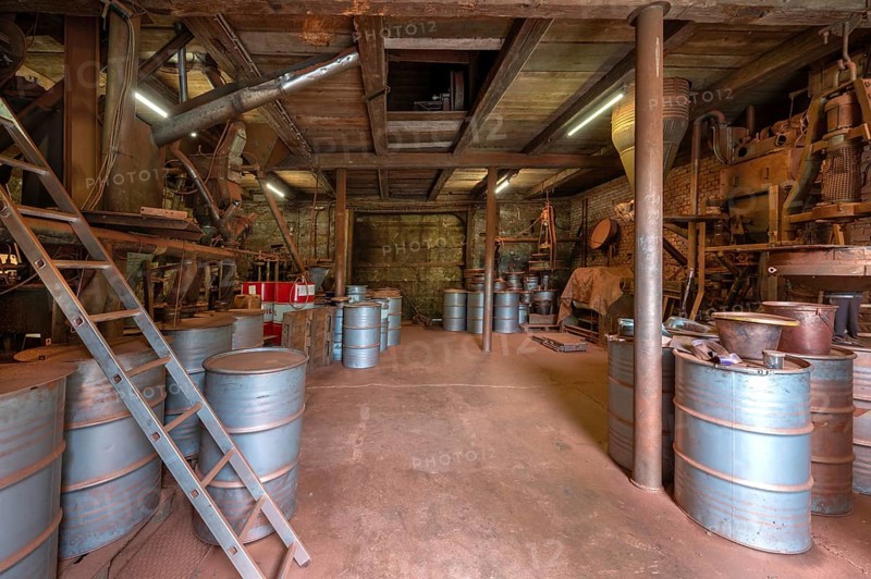 Metal drums for bronze powder from a metal powder mill, founded in 1900, Igensdorf, Upper Franconia, Bavaria, Germany, Europe