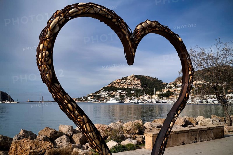 View through a heart of stones to the harbour of Port d'Andratx with marina, Majorca, Balearic Islands, Balearic Islands, Spain, Europe