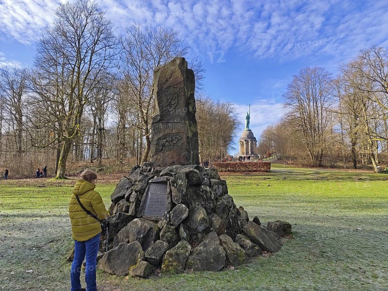 Woman looking at the Bismarck Monument, behind the Hermann Monument, Hiddesen, Detmold, Teutoburg Forest, North Rhine-Westphalia, Germany, Europe