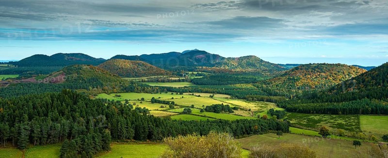 Auvergne Volcanoes Regional Natural Park. View of the Puys chain, UNESCO World Heritage Site, Puy de Dome, Auvergne-Rhone-Alpes, France, Europe