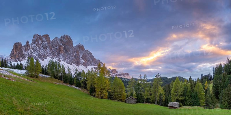 View of a part of the Geisler group in the foreground two alpine huts, sunset, Dolomites, snow, Puez-Geisler nature park Park, St. Magdalena, Funes, Villnößtal, South Tyrol, Italy, Europe