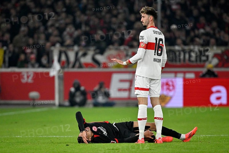 Atakan Karazor VfB Stuttgart (16) with Hugo Ekitike Eintracht Frankfurt SGE (11) injured Injury MHPArena, MHP Arena Stuttgart, Baden-Württemberg, Germany, Europe